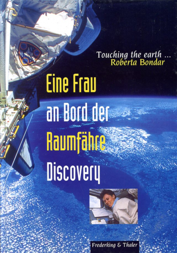 Eine Frau an Bord der Raumfähre Discovery: Touching the earth